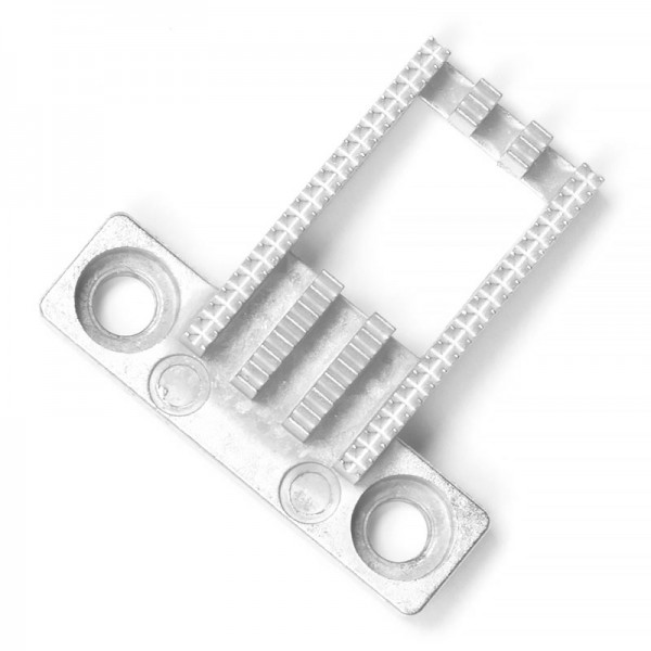 Фото 1: Зубья транспортера ткани