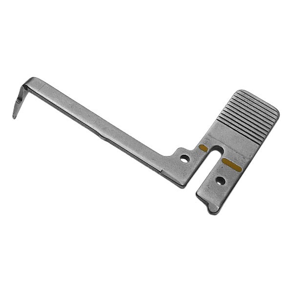 Фото 1: Стежковый язычок к оверлоку Brother M-3034D